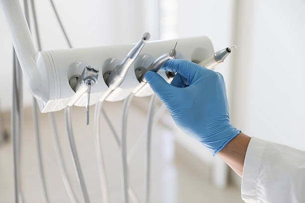 Professional Tooth Extraction technician working in Clark Mills, NY